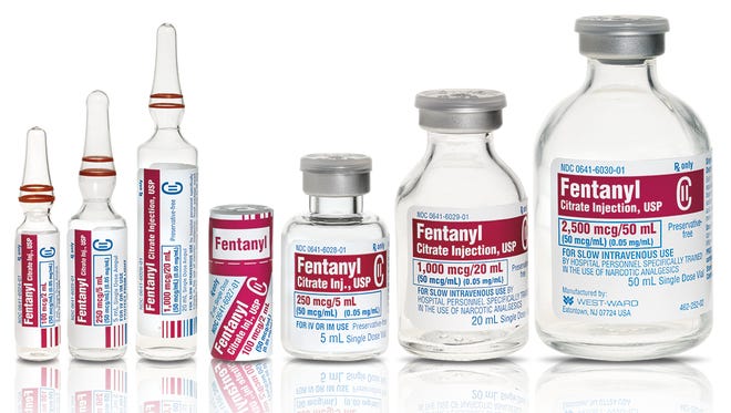 a lineup of 7 different vials of fentanyl - each a different volume and shape, including 3 ampules and 4 sizes of flip-off caps.